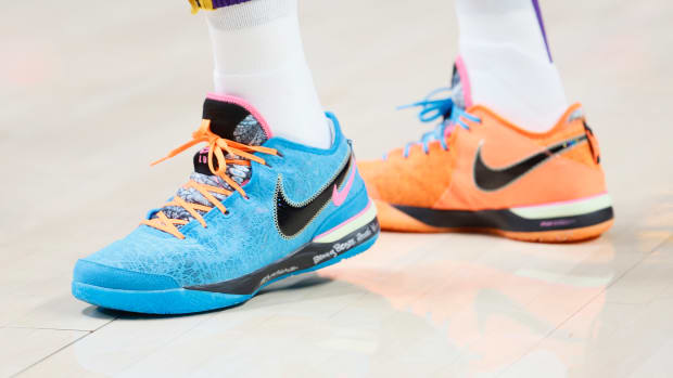 View of LeBron James' blue and orange shoes.